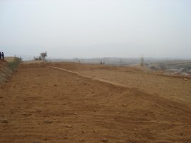 土地平整 房地產(chǎn)開(kāi)發(fā)的首要基石與系統(tǒng)工程
